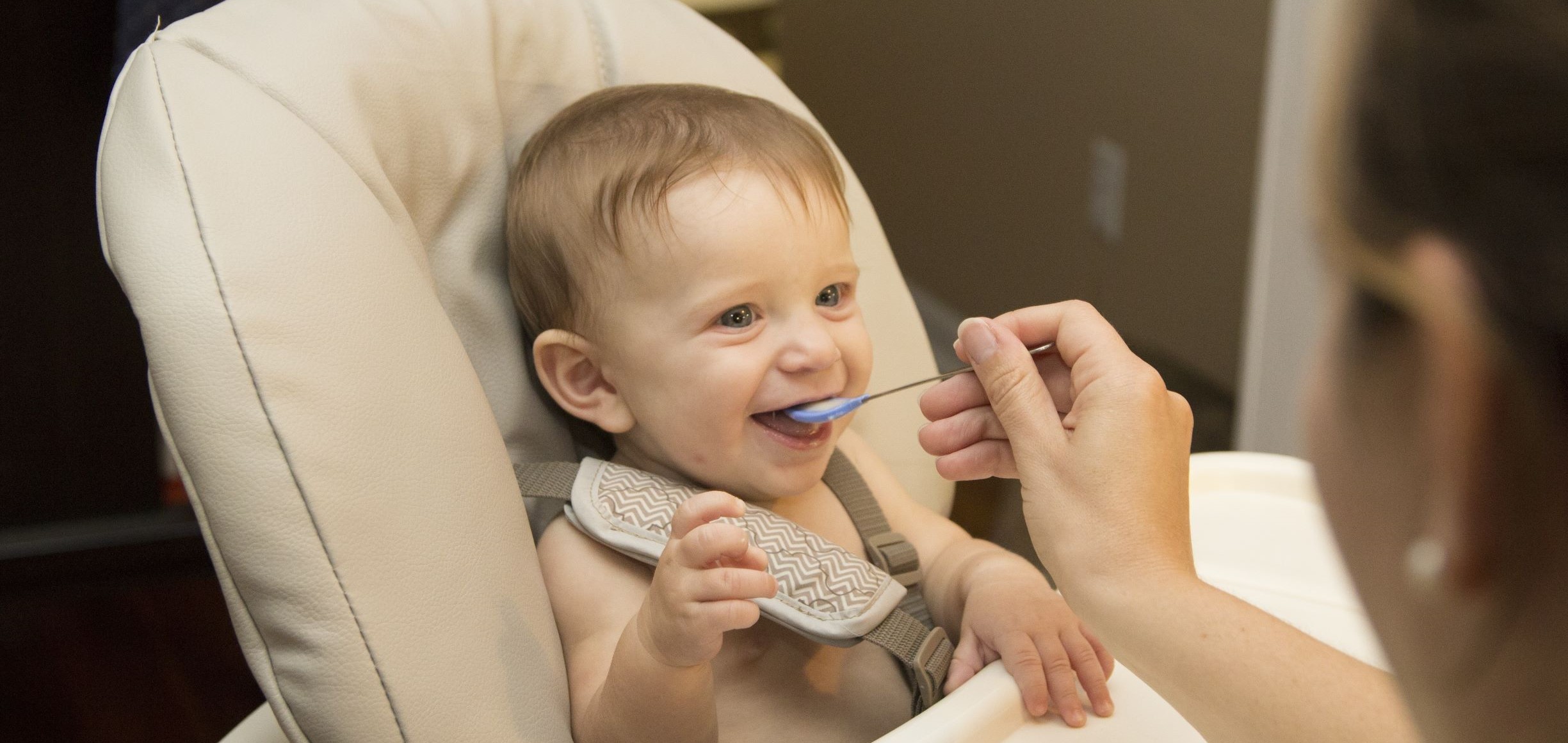 Baby being fed